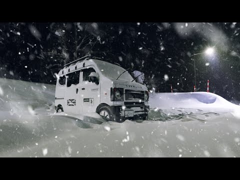 Sleeping alone in a car in the mountains during a blizzard