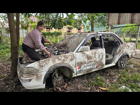Girl repairs and restores old cars with broken engines that don't work.