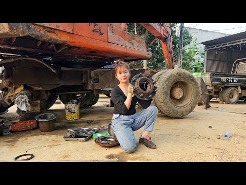 Genius girl replaces rear wheel bearings for excavator