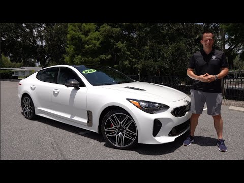 Is the 2023 Kia Stinger GT a BETTER luxury sedan than a Mercedes AMG C43?