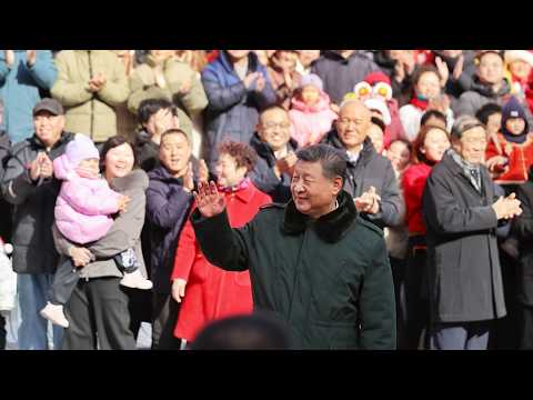 Chinese President Xi Jinping visits people in Beijing ahead of Spring Festival