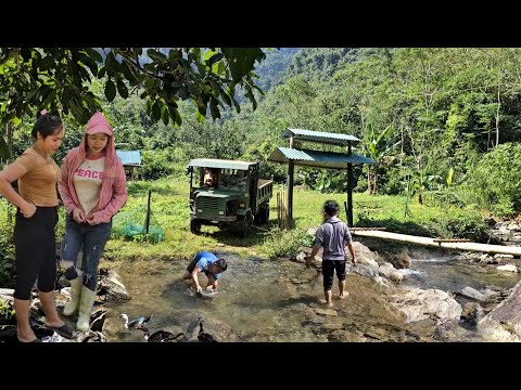 A day of excavators and trucks in the Vietnamese countryside.