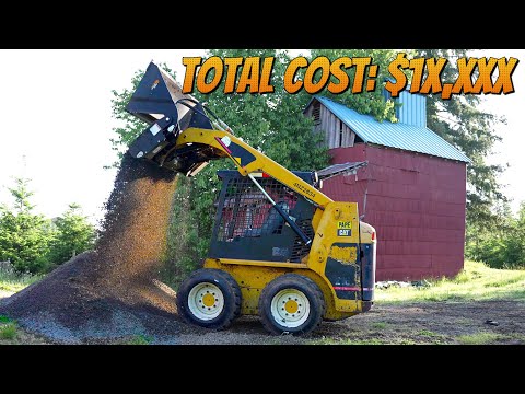 Putting the rebuilt skid steer to work.  Was it worth the time and money to fix?