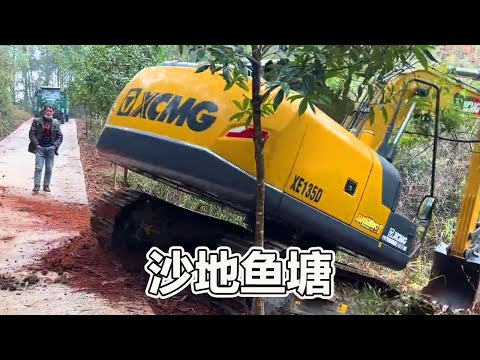 The first fish pond dug by the excavator, thanks to my wit