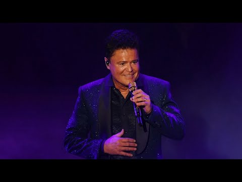 Concertgoer sues Donny Osmond, claims she was hit by giant ball at Vegas show