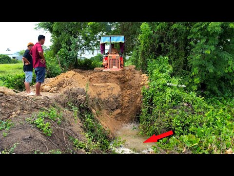 Incredible !! Landfilling repair road skiller operator Bulldozer pushing  soil into the water.