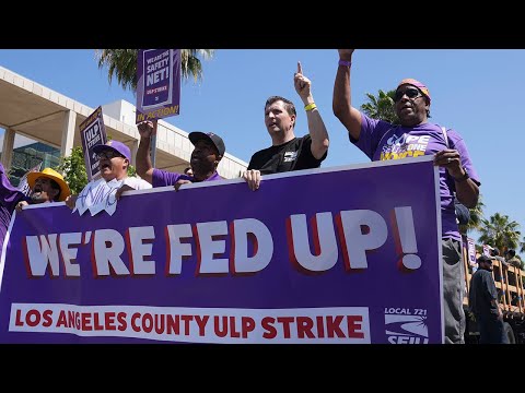 Thousands of striking county workers march through downtown LA