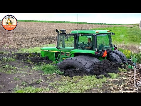 Unbelievable moment when tractor stuck in mud and extremely dangerous way to handle it