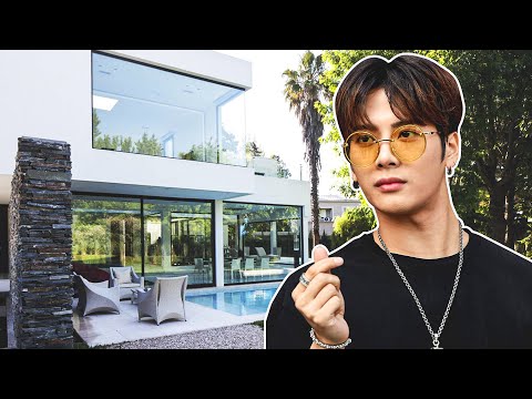 How does Jackson Wang lives and how much does he earn