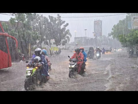 A RURAL VILLAGE UNDER THE WRATH OF TORRENTIAL RAIN AND FEROCIOUS WINDS
