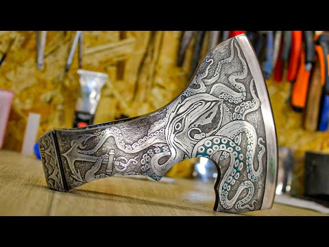 An axe with an octopus.  2 months of work.  Drawing on metal.  Simple technology from a rusty axe