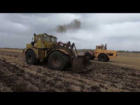 Трактор Кировец. Заливаю воду в колёса. Выкапываем камни в поле.