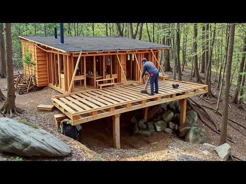 Man Builds Cabin Using Abandoned Pallets and Logs on a Steep Mountain
