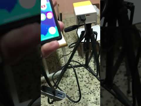 توصيل بروجكتر YG300 بالتلفون وبسماعات خارجية.