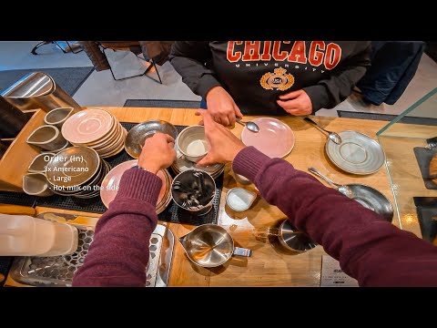 POV - Barista works at a busy coffee shop