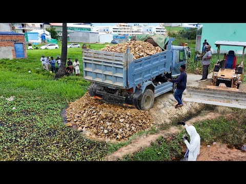 Great Work Quick KOMATSU Bulldozer With Dump Truck Filling Stone Flooded Area