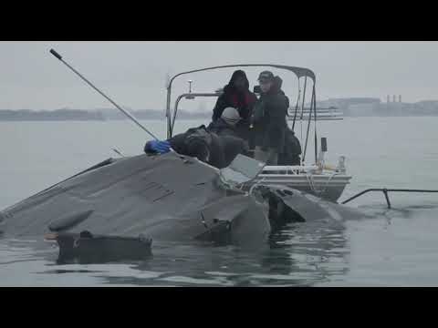 See the D.C. helicopter crash debris: Watch investigators search what remains from crash scene