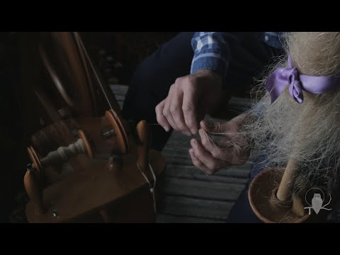 It's raining so I'm spinning flax