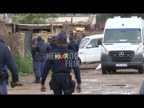 SAPS combing the scene of the Bekkersdal tavern shooting