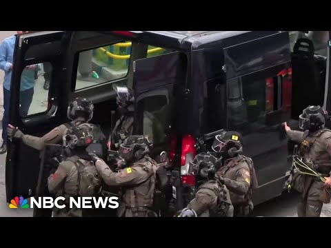 Manhunt underway after bank heist in Italy holds 25 people hostage