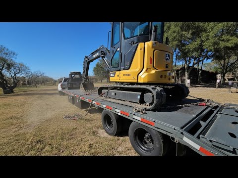 MOVING HEAVY EQUIPMENT! Chained and Secured! Texas Pride Trailer Deck Over