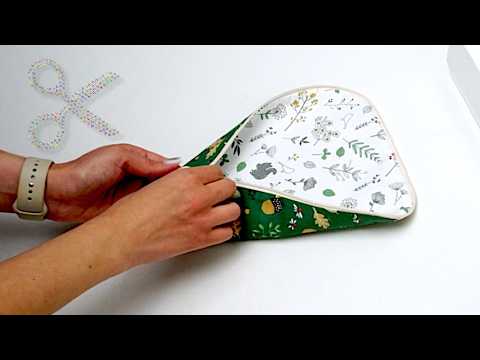 Sew an original and very convenient pencil case from just two pieces of fabric.