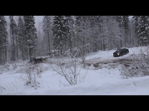 It's freezing, the DT-75 is making way for timber trucks.