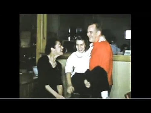 Welcoming guests to your holiday party (1950s)