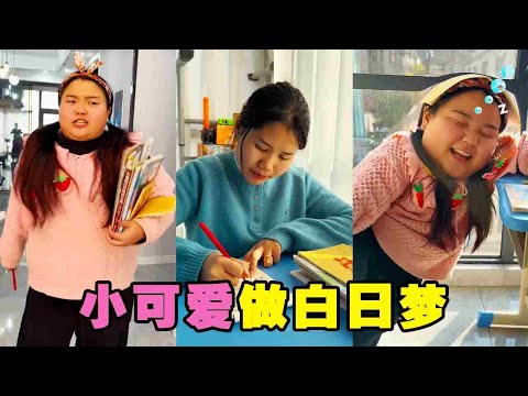 The little cute is dissatisfied with too much homework.