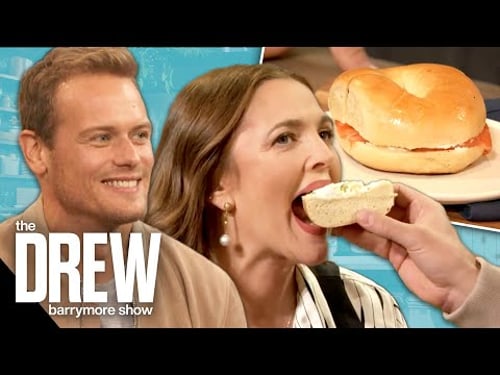 Sam Heughan Feeds Drew as She Helps Him Find the Best Bagel in NYC