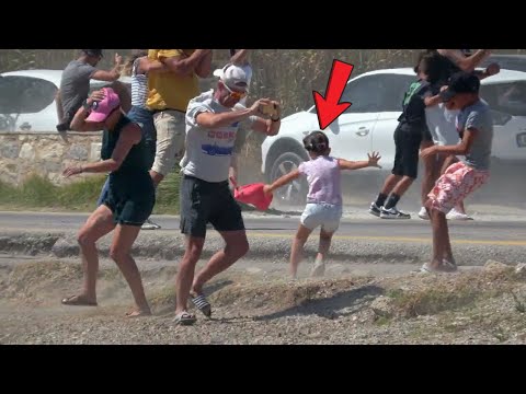 Family with kids BLOWN into the sea by jet blast at Skiathos Airport