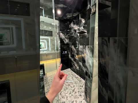 This luxury bathroom comes with city views!