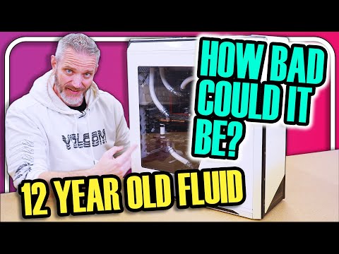 I wasn't ready for what was inside this 12 Year old Watercooled PC...