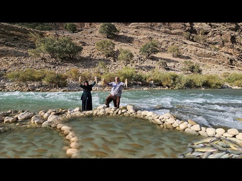 The secret of a nomadic couple's traditional fishing technique in the heart of a mountain river 🐟