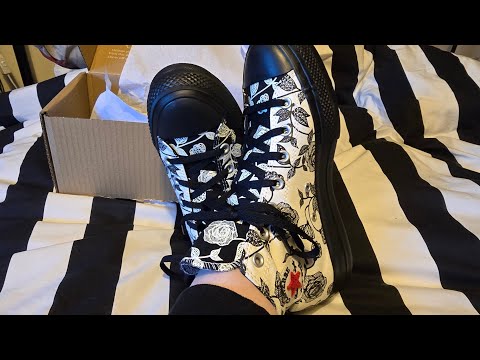 Converse design hi tops shoes.