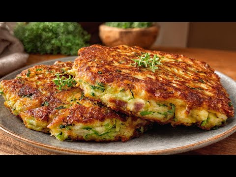 These zucchinis are addictive! 2 eggs and 2 zucchinis – and the taste is amazing.