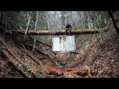 Building a Secure Polyethylene House Suspended Over a Cliff on a Fallen Tree