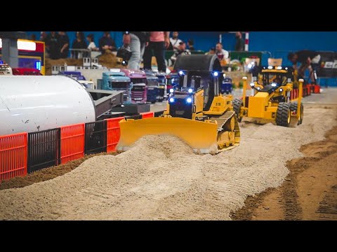 Watch These Tiny Trucks Build a Mini Road!
