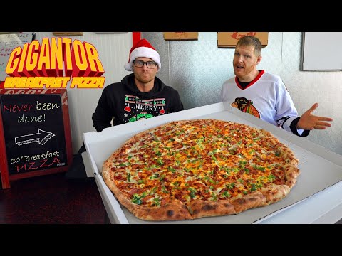TAKING ON THE BIGGEST BREAKFAST PIZZA EVER MADE | THIS GIGANTOR IS INSANE!