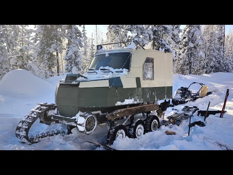 Repairing a tracked all-terrain vehicle right in the taiga