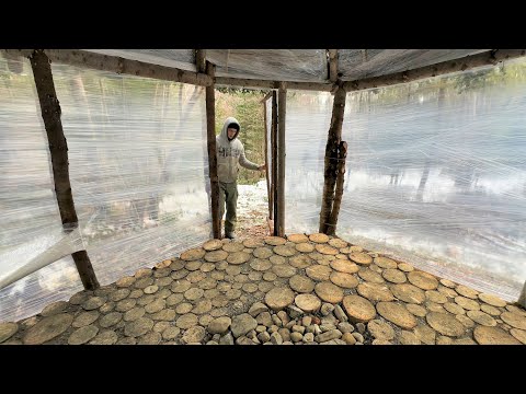 Building a warm shelter for survival with plastic wrap and wood stove, survival in the wild