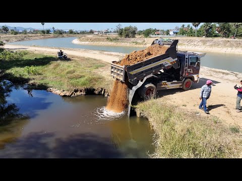 First start a new project with a Komatsu D20-A bulldozer pushing soil into the field