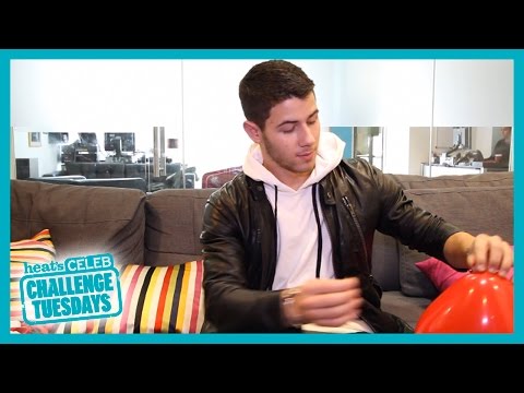 Nick Jonas popping the question balloons!