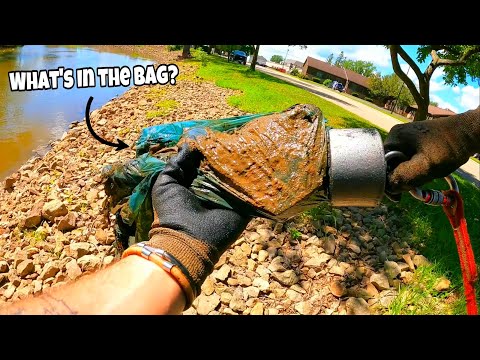 I Found A Full Plastic Bag Underwater In The River! (Magnet Fishing)