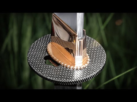 Tsuba: Crafted from Steel, Detailed with Silver Inlay