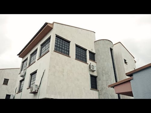 They Turned Two Duplexes Into a 14-Room Hotel | myCompound