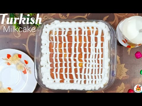 TURKISH MILK CAKE | A DREAM CAKE DRENCHED IN GOODNESS OF MILK TOP WITH CARAMEL SAUCE .