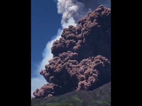 Tourists run down Mount Etna as volcano erupts