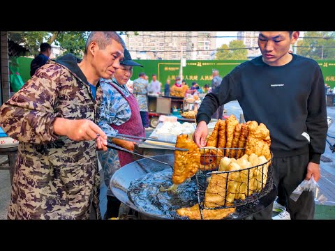 Delicious street food in Wuhan, China: Sanxian Doupi and Braised Pork Trotters, bustling with life.