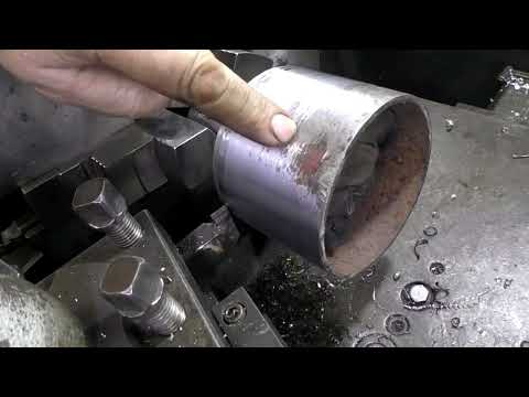 Grinder drive roller made from rusty pipe. Be careful, turning!